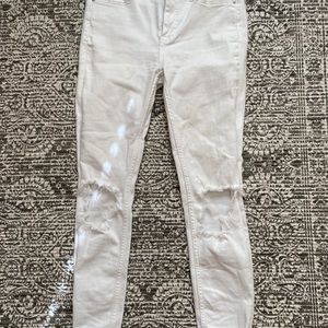 Free People White Jeans with holes in knees